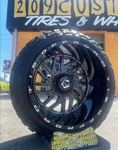 TIS OFF ROAD WHEELS 544 BLACK AND MILLED 22X12 6X139.7 WITH MUD TIRES